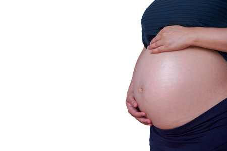 Asian pregnant woman isolated on white backgroundの写真素材