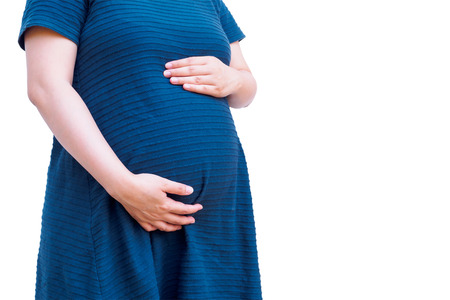 Asian pregnant woman isolated on white backgroundの写真素材