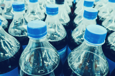 Carbonated soft drink bottles close upの写真素材