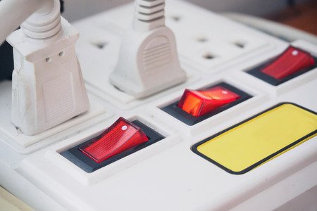 Multiple power socket with connected plugsの写真素材