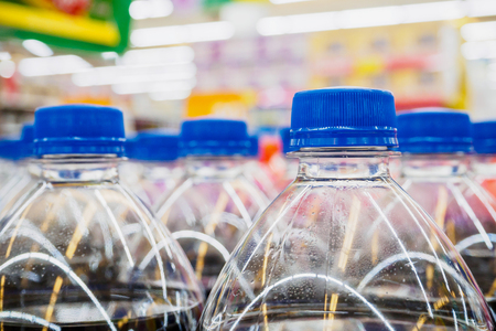 soft drinks bottles in supermarketの写真素材