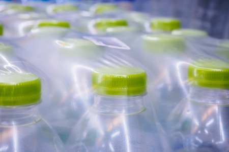 Water bottles in plastic wrapの写真素材