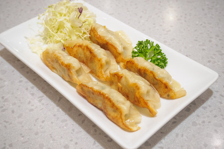Gyoza dumplings with vegetables, japanese foodの写真素材