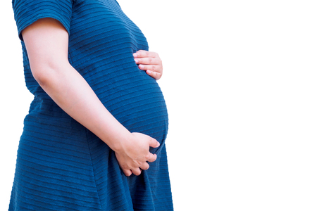 Asian pregnant woman isolated on white backgroundの写真素材