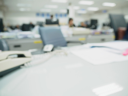 office blurred background with people working at deskの写真素材