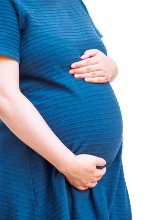 Asian pregnant woman isolated on white backgroundの写真素材