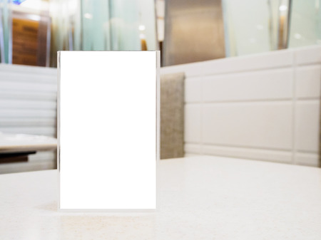 Mock up Blank Menu frame on Table in cafe restaurantの写真素材