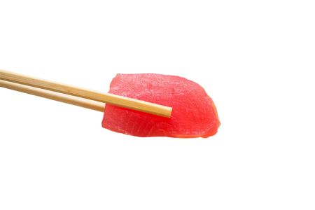 tuna slice sashimi in chopsticks isolated on white backgroundの写真素材