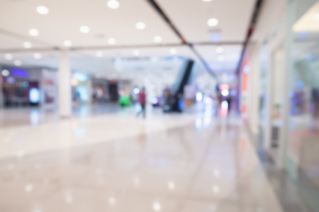 Abstract blur defocused shopping mall interior backgroundの写真素材