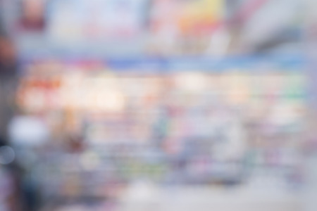 Abstract supermarket convenience store shelves blurred backgroundの写真素材