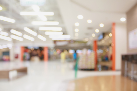 Abstract blur shopping mall background with bokeh lightの写真素材