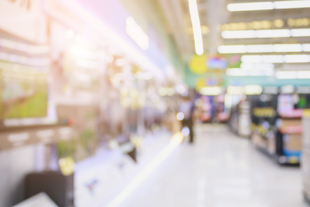 Television show in electronic department store with customer in shopping mall with bokeh light defocused blurred backgroundの写真素材