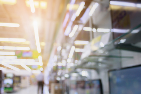 Television show in electronic department store with customer in shopping mall with bokeh light defocused blurred backgroundの写真素材