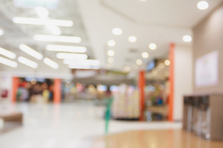 Abstract blur shopping mall background with bokeh lightの写真素材
