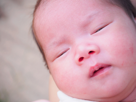Cute asian Newborn baby girlの写真素材