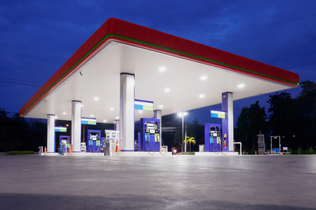 Gas station at night timeの写真素材