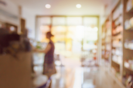 Pharmacy drugstore with customer abstract blur backgroundの写真素材