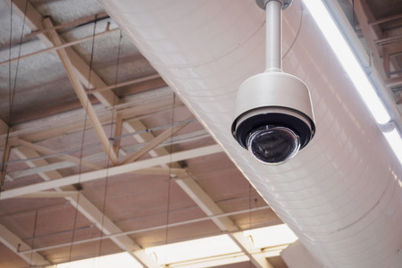 security cctv camera in supermarket buildingの写真素材