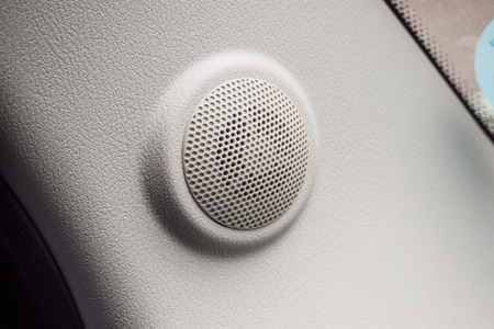 close up round speaker audio in modern carの写真素材