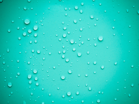Water drops on blue backgroundの写真素材