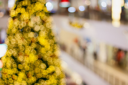 Abstract blurry bokeh Christmas with shopping mall defocused backgroundの写真素材