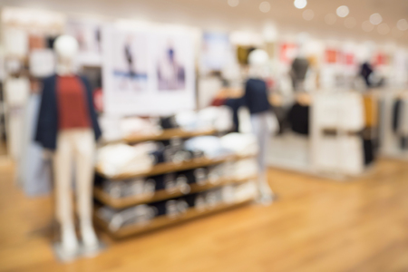 clothing store in shopping mall boutique shop interior blur defocused background