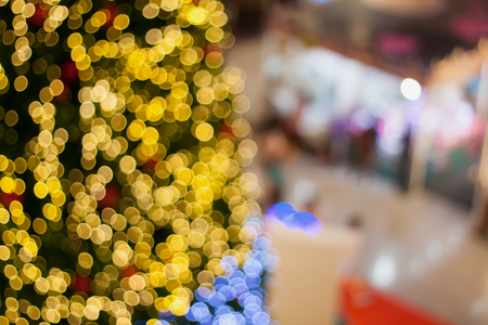 Abstract blurry bokeh Christmas with shopping mall defocused backgroundの写真素材