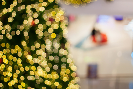 Abstract blurry bokeh Christmas with shopping mall defocused backgroundの写真素材