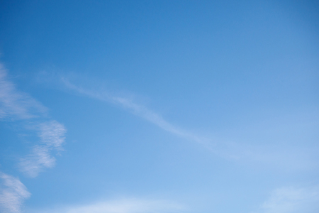blue sky with white cloudsの写真素材
