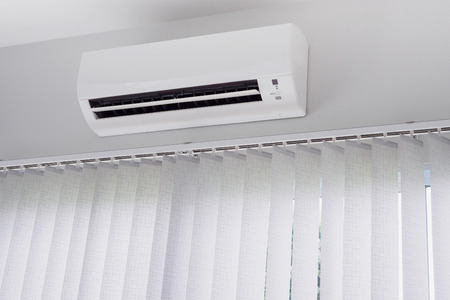 Air conditioner on white wall backgroundの写真素材