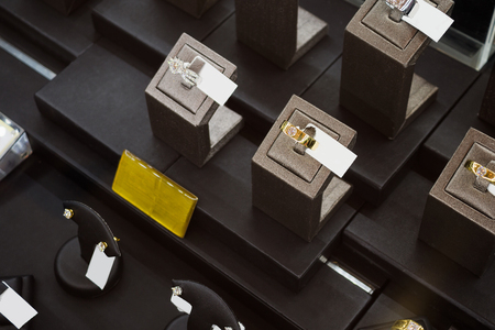 Diamond rings with blank price tag show in jewelry luxury store window display showcaseの写真素材