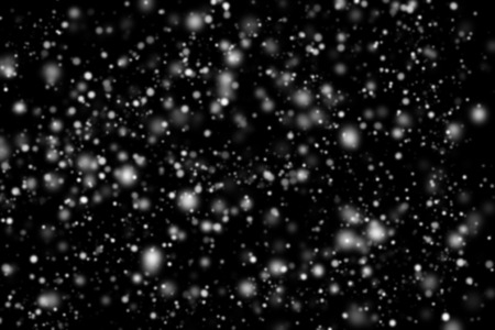 Abstract snowfall on black backgroundの写真素材