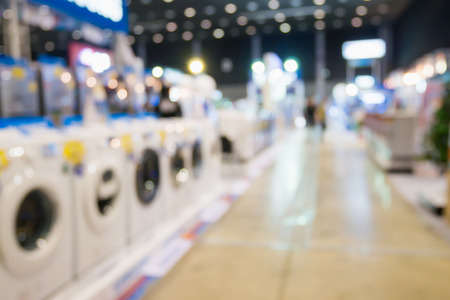 Washing machines in home appliance electronic department retail store blur backgroundの写真素材