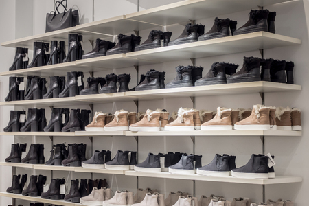 shoes on shelves in the clothing storeの写真素材