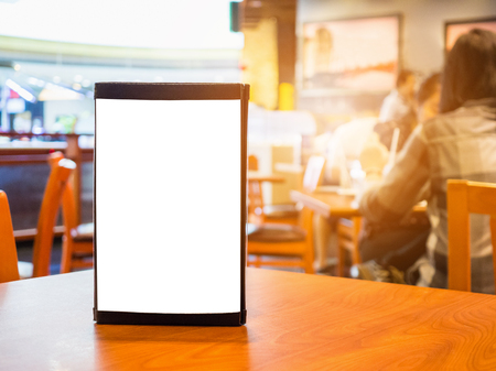 Mock up Blank white menu frame on cafe restaurant tableの写真素材