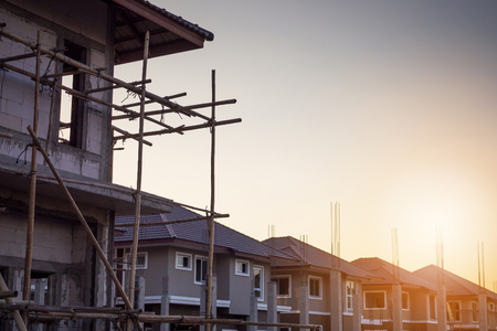 construction residential new house in progress at building siteの写真素材