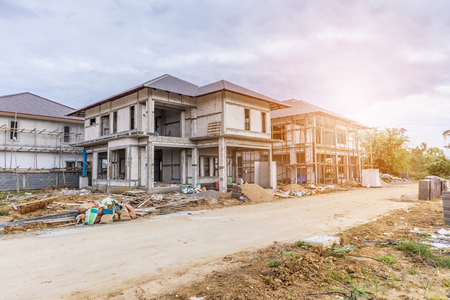 construction residential new house in progress at building siteの写真素材