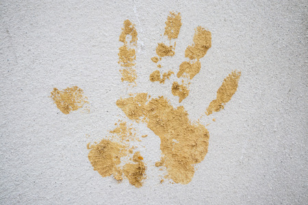 hand print on cement wallの写真素材