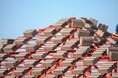 Roof house construction with lots of tile prepare to Installの写真素材