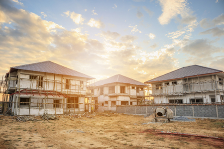 construction residential new house in progress at building siteの写真素材