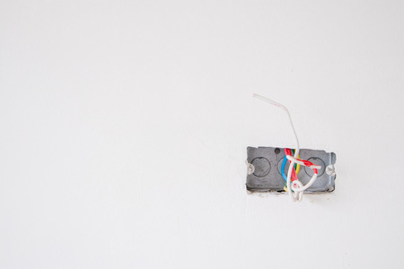 electric line in the wall socket at house constructionの写真素材