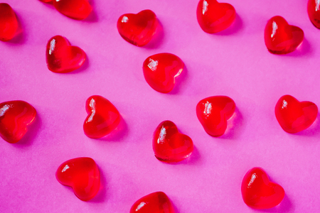 Valentines day background with heart shape candy on pink backgroundの写真素材