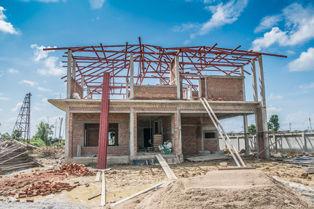 construction residential new house in progress at building siteの写真素材
