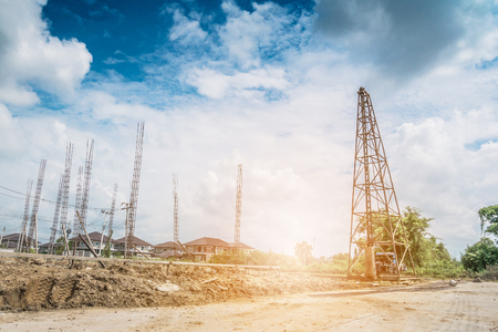 pile driver at house building construction siteの写真素材
