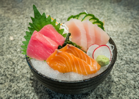 Sashimi set with salmon tuna on iceの写真素材