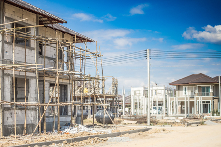 construction residential new house in progress at building siteの写真素材