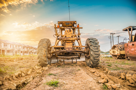heavy machinery working at construction siteの写真素材