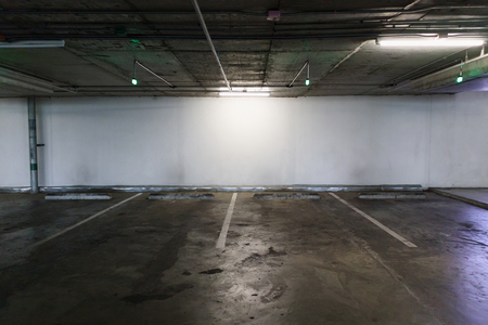 Empty car parking lot space interior backgroundの写真素材