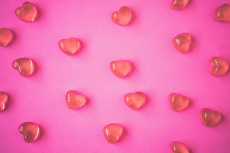 Valentines day background with heart shape candy on pink backgroundの写真素材