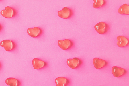 Valentines day background with heart shape candy on pink backgroundの写真素材